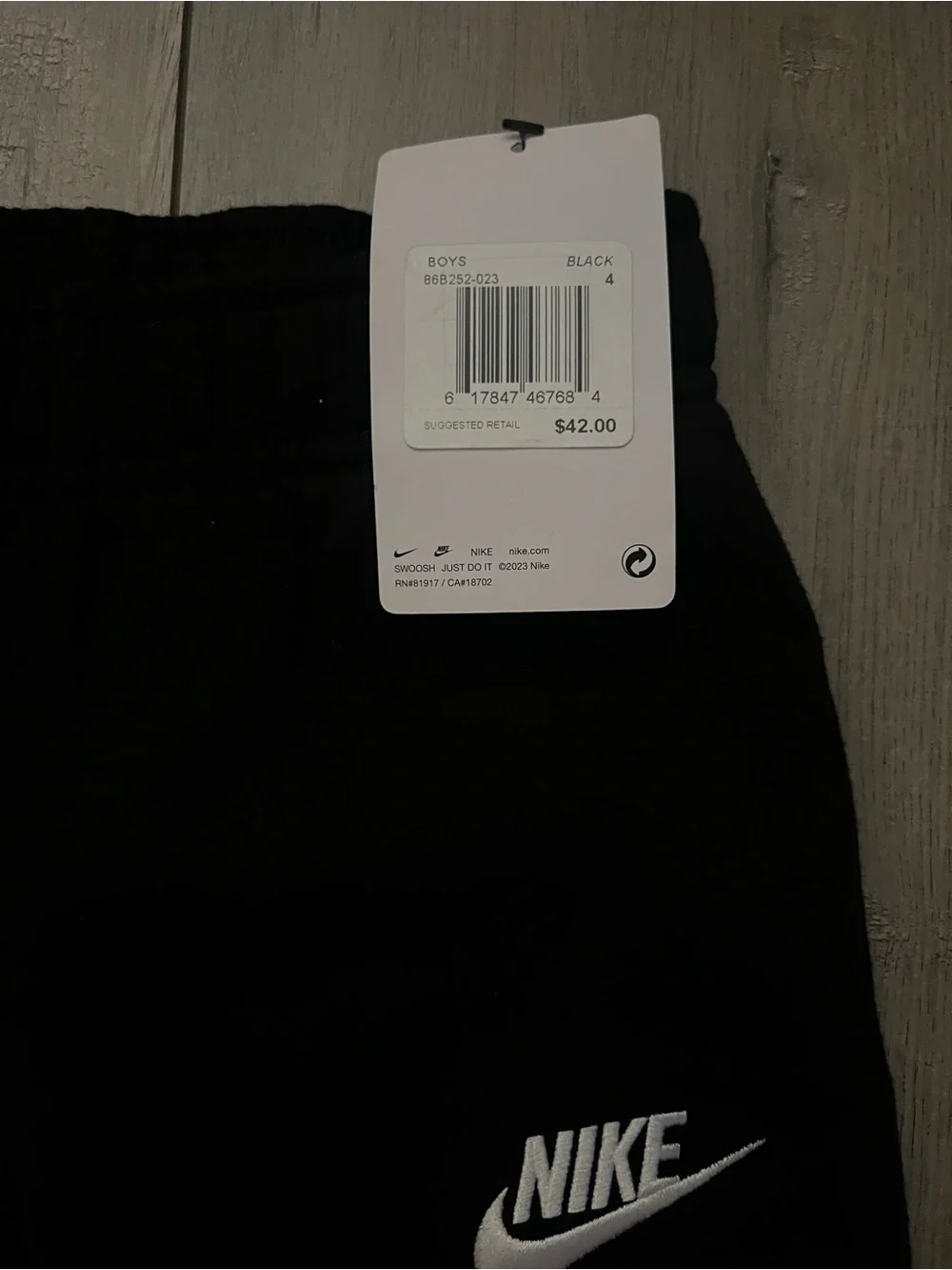 Nike Black Kids Joggers with White Swoosh